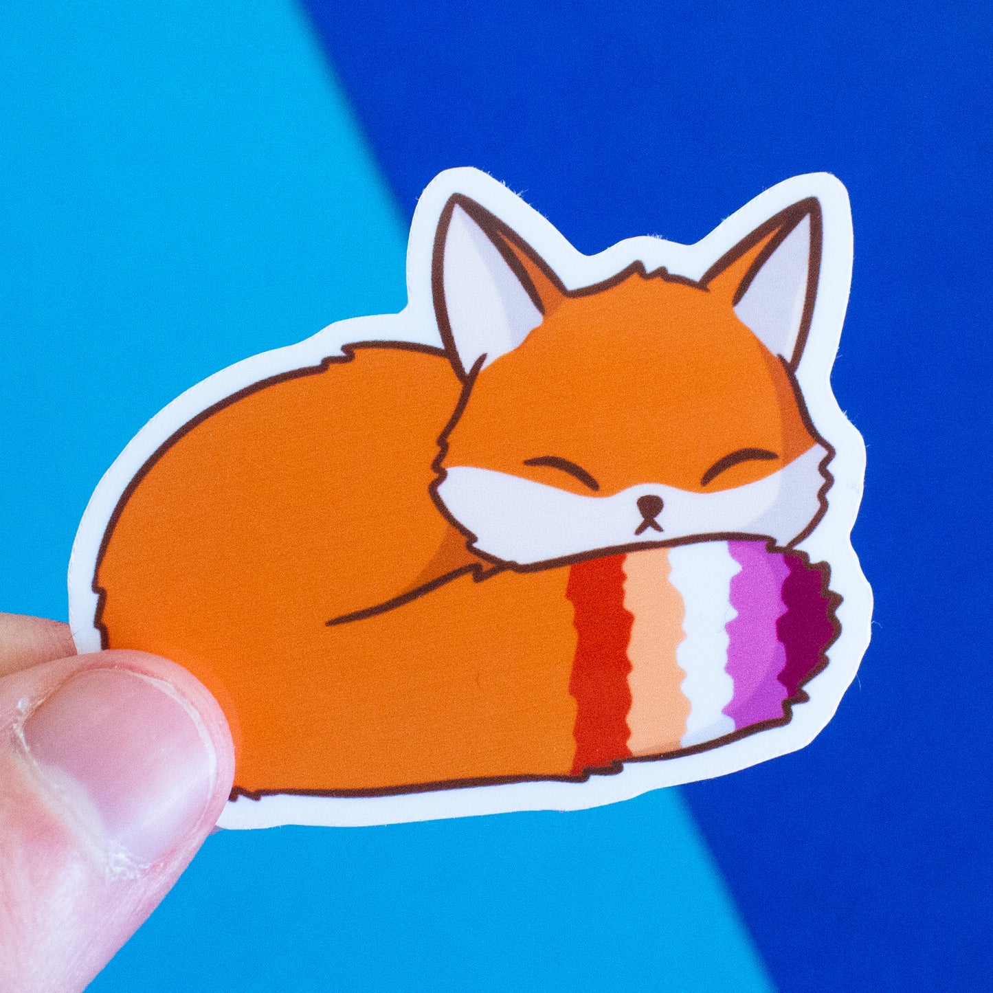 Schlafender Fuchs mit Pride-Schweif Sticker